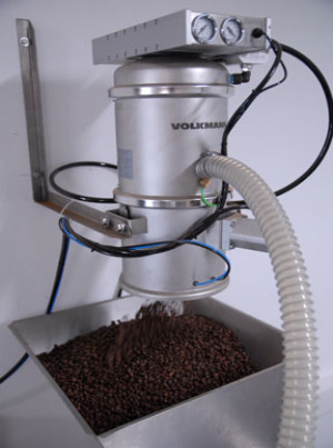 Volkmann pneumatic vacuum conveyor transfers coffee and other dry, bulk solids